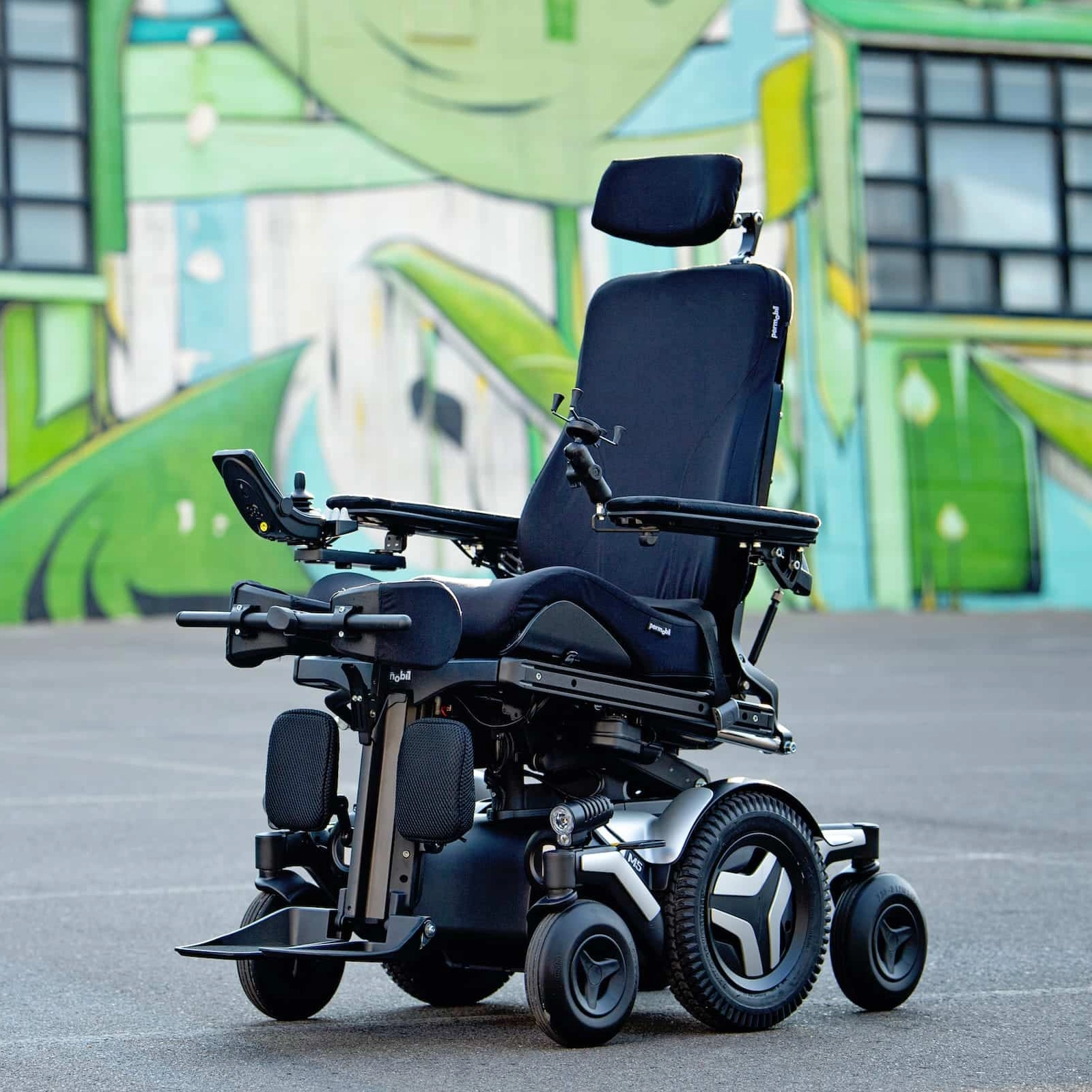 Complex rehab power wheelchair with advanced seating and positioning systems